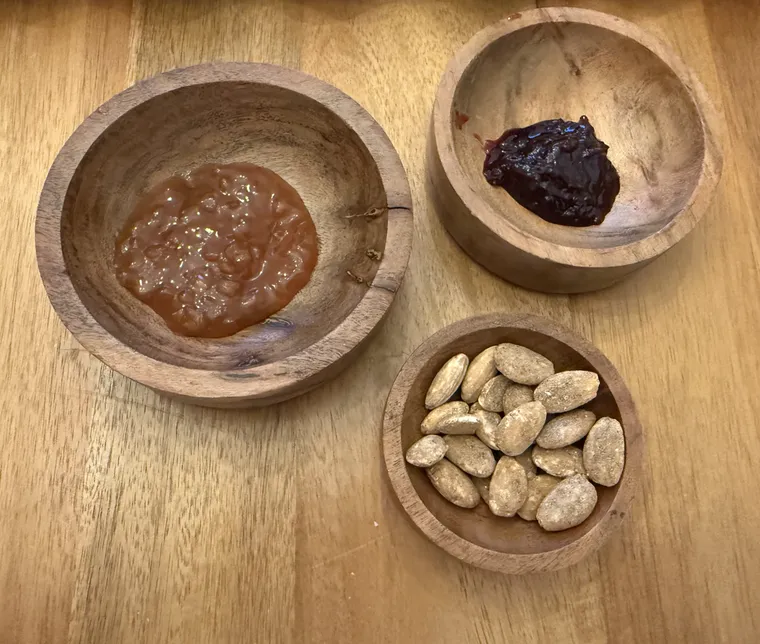 Three small wooden bowls
