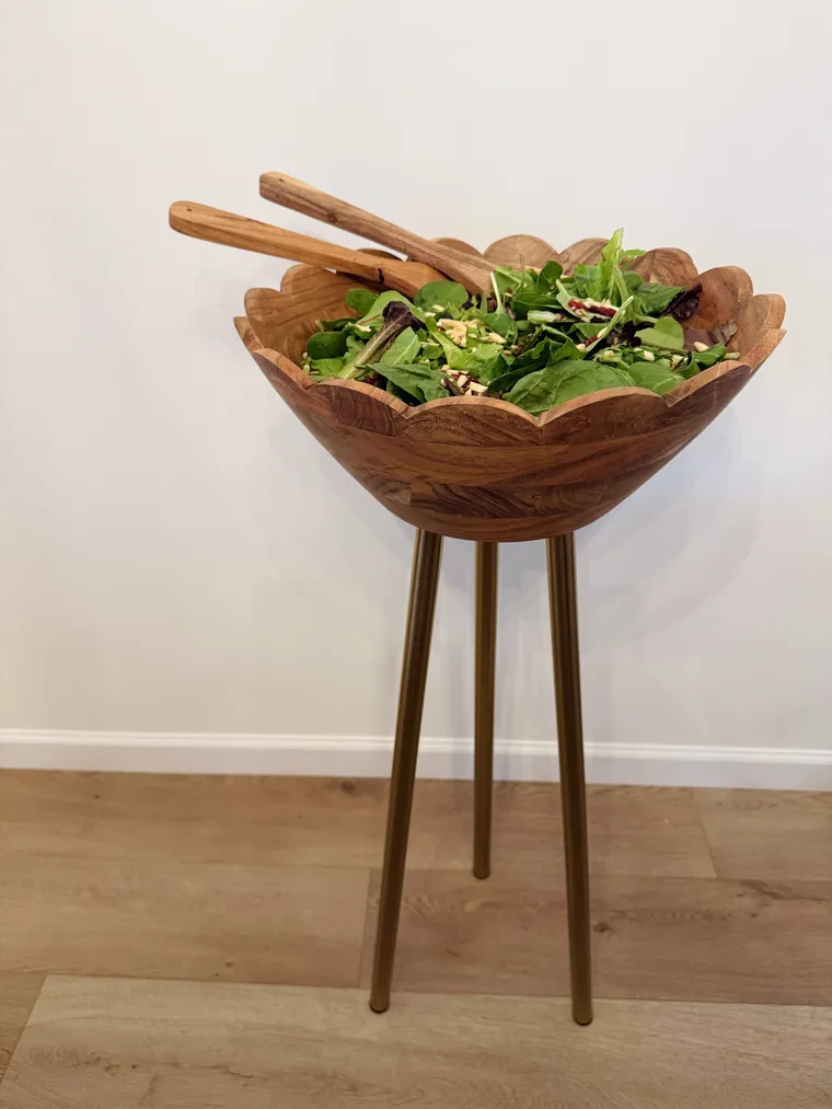 Elevated wooden salad bowl, with servers
